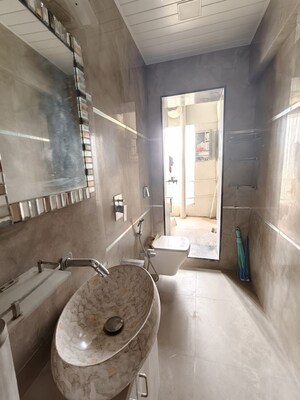 Bathroom in 3 BHK Apartment at Dheeraj Valley, Goregaon East – for Rent