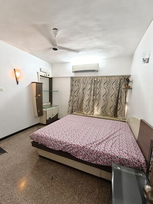 Bedroom in 3 BHK Apartment at Dheeraj Valley, Goregaon East – for Rent