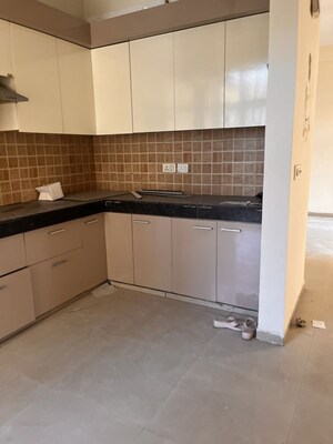 Kitchen in 3 BHK Apartment at Mahagun My Woods, Sector 16c Greater Noida – for Rent