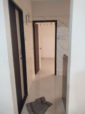 Building Lobby in 1 BHK Apartment at Apex Avenue, Karanjade – for Rent