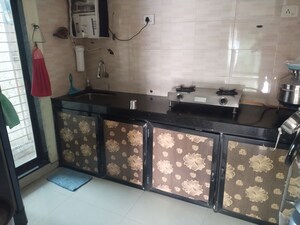 Kitchen in 2 BHK Apartment at Om Sai Supreme Arcade, Vadghar – for Sale