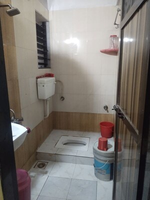 Bathroom in 2 BHK Apartment at Om Sai Supreme Arcade, Vadghar – for Sale