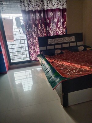 Bedroom in 2 BHK Apartment at Om Sai Supreme Arcade, Vadghar – for Sale