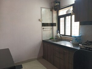 Kitchen in 2 BHK Apartment at Puraniks Kanchanpushp Complex, Kavesar – for Rent