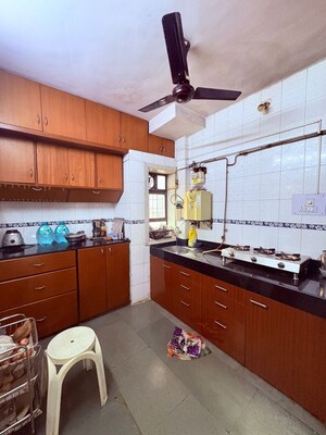 Kitchen in 2.5 BHK Apartment at Siddhivinayak Tower Runwal Nagar, Kolbad – for Sale