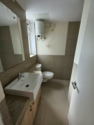 Bathroom in 3.5 BHK Apartment at Emaar Palm Gardens, Sector 83 – for Sale