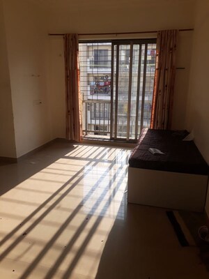Living Room in 2 BHK Apartment at Kailash Height, Virar West – for Rent