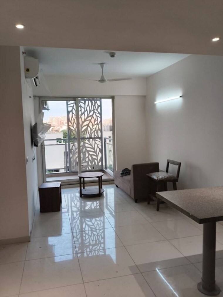 Living Room, godrej-golf-links-evoke 1.5 Bedroom 710 Sq.Ft. Apartment In Sector 27 Yamuna Expressway Greater Noida 10766208
