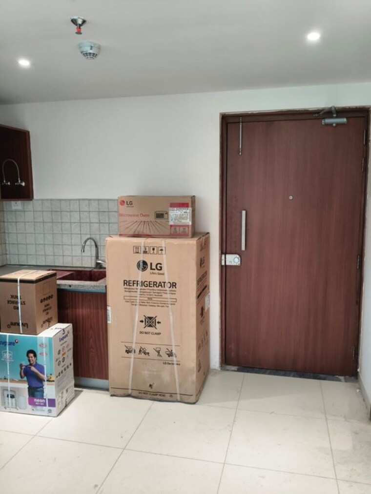 Living Room, godrej-golf-links-evoke 1.5 Bedroom 710 Sq.Ft. Apartment In Sector 27 Yamuna Expressway Greater Noida 10766208