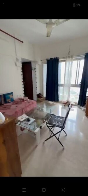 Team Area in 1 BHK Apartment at Omkar Signet, Malad East – for Rent