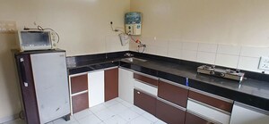 Kitchen in 2.5 BHK Apartment at Ravetkar Himanshu, Karve Road – for Rent