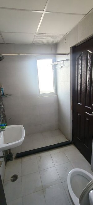 Bathroom in 3 BHK Apartment at JM Aroma, Sector 75 – for Rent