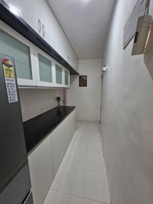 Kitchen in 2 BHK Apartment at Ganga Sarovar, Wadgaon Sheri – for Rent