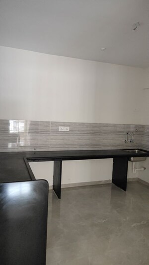 Kitchen in 2 BHK Apartment at Lotus Urban Homes, Charholi Budruk – for Rent