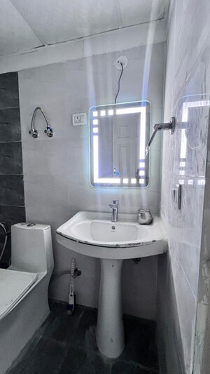 Bathroom in 3 BHK Apartment at Migsun Roof, Raj Nagar Extension – for Rent