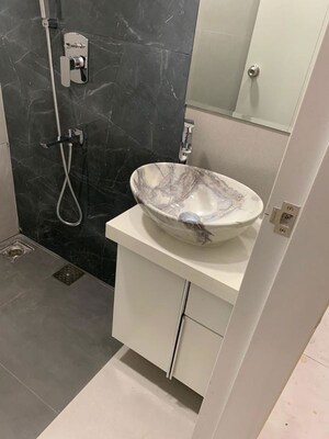 Bathroom in 1 BHK Apartment at Sundervan Crystal CHS, Andheri West – for Sale