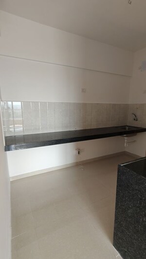 Kitchen in 2 BHK Apartment at Shapoorji Pallonji Joyville Hadapsar Annexe, Hadapsar – for Rent