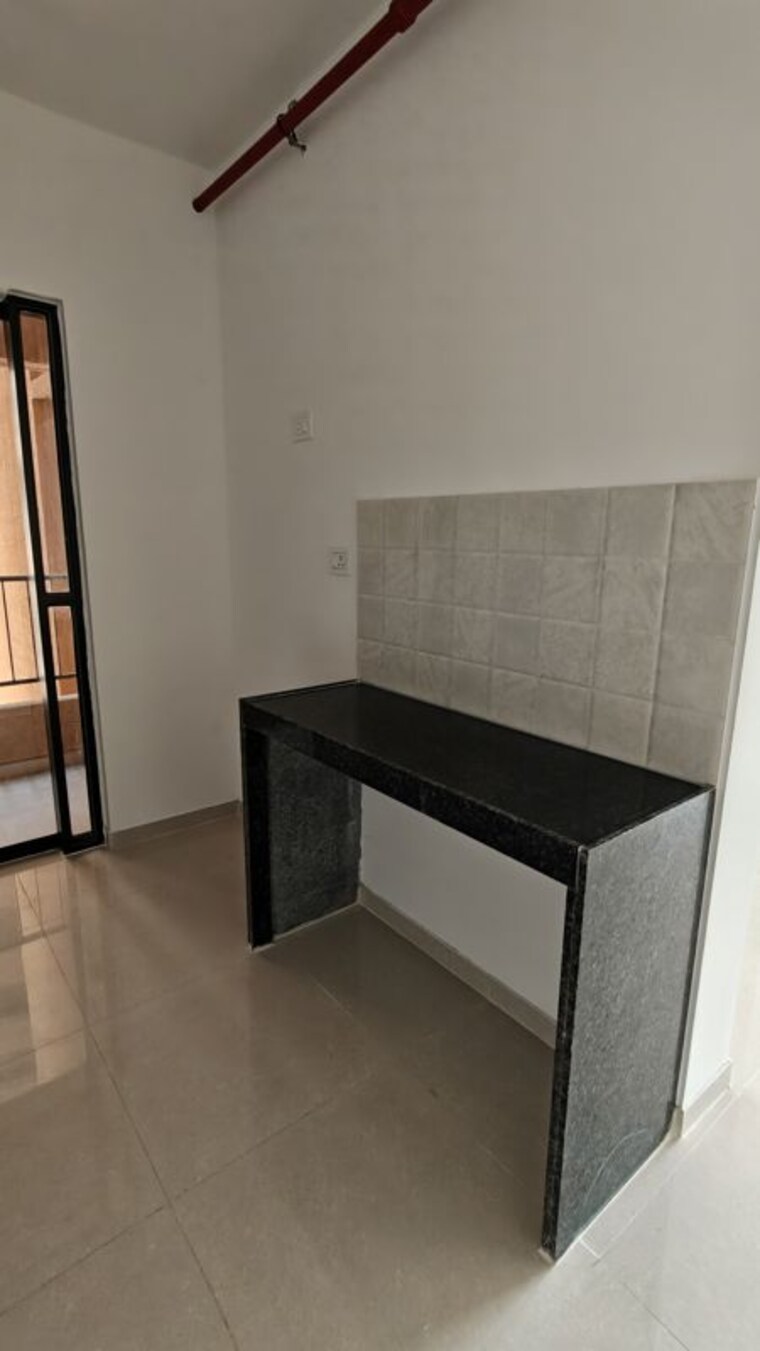 Kitchen, shapoorji-pallonji-joyville-hadapsar-annexe 2 Bedroom 669 Sq.Ft. Apartment In Hadapsar Pune 10766599
