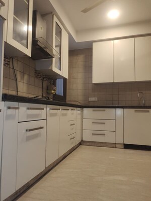 Kitchen in 4 BHK Builder Floor at Kailash Colony – for Rent
