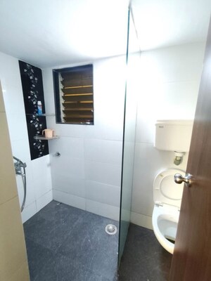 Bathroom in 2 BHK Apartment at Arsiwala Essar Apex, Virar West – for Rent