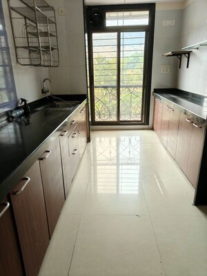 Kitchen in 3 BHK Apartment at Nisarg Hyde Park, Kharghar – for Rent