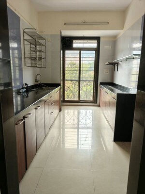 Kitchen in 3 BHK Apartment at Nisarg Hyde Park, Kharghar – for Rent