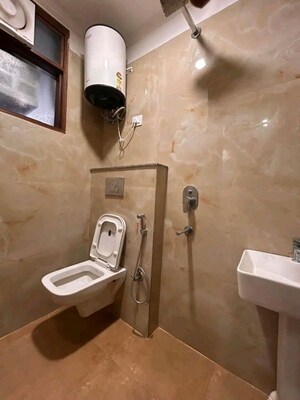 Bathroom in 2 BHK Apartment at Chattarpur – for Rent