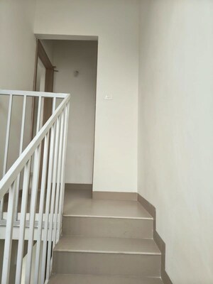 Staircase in 3 BHK Apartment at Gera Planet Of Joy, Kharadi – for Rent