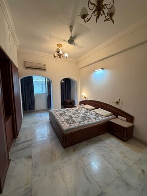 Living Room in 2 BHK Apartment at Andheri CHS, Andheri West – for Rent