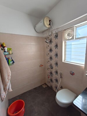 Bathroom in 2 BHK Apartment at Kolte Patil Langston, Kharadi – for Rent