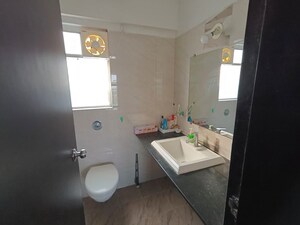 Bathroom in 2 BHK Apartment at Kolte Patil Langston, Kharadi – for Rent