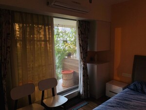 Living Room in 1 BHK Apartment at Andheri West – for Sale