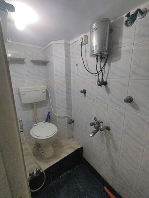 Bathroom in 2 BHK Apartment at Rajiv CHS Matunga, Matunga West – for Rent