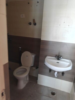 Bathroom in 2 BHK Apartment at Aims Golf City, Sector 75 – for Rent
