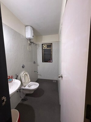 Bathroom in 3 BHK Apartment at Veer Mahal CHS, Lalbaug – for Rent