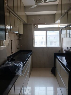 Kitchen in 3 BHK Apartment at Veer Mahal CHS, Lalbaug – for Rent