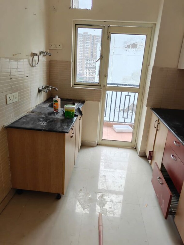 Kitchen, maxblis-white-house 2 Bedroom 900 Sq.Ft. Apartment In Sector 75 Noida 10767174