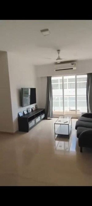 Living Room in 2.5 BHK Apartment at Andheri CHS, Andheri West – for Rent
