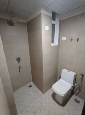 Bathroom in 1 RK Apartment at Earthcon Beetle Orchid, Knowledge Park 3 Greater Noida – for Sale