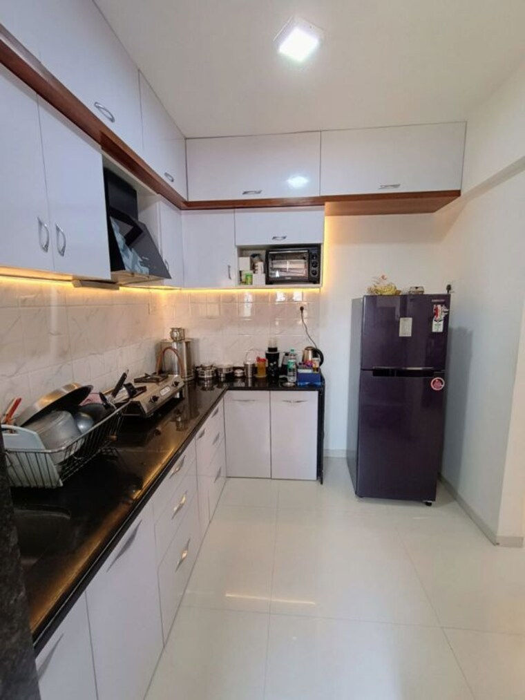 Kitchen, pristine-allure 2 Bedroom 782 Sq.Ft. Apartment In Kharadi Pune 10767253