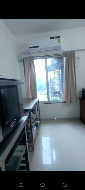 Living Room in 1 BHK Apartment at Birla Prabhadevi, Prabhadevi – for Rent