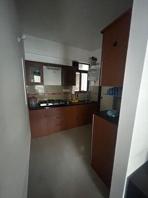 Kitchen in 2 BHK Apartment at Gulmohar Queenstown, Kharadi – for Rent