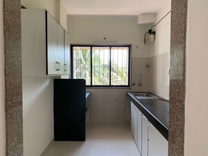 Kitchen in 2 BHK Apartment at Orchid Glade, Santacruz West – for Rent