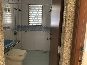 Bathroom in 2 BHK Apartment at Orchid Glade, Santacruz West – for Rent