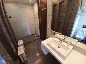 Bathroom in 3 BHK Apartment at Safdarjung Enclave – for Rent