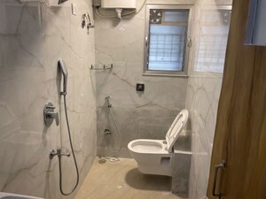 Bathroom in 2 BHK Apartment at Nirman Kutir, Yari Road – for Rent