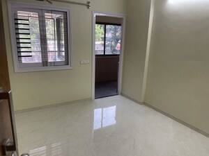 Master Bedroom in 2 BHK Apartment at Nirman Kutir, Yari Road – for Rent