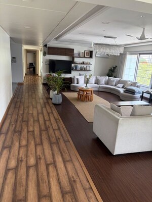 Living Room in 4 BHK Apartment at Suyog Platinum Tower, Sangamvadi – for Sale