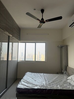 Room in 2 BHK Apartment at Omkar Signet, Malad East – for Rent
