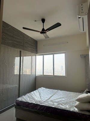 Bedroom in 2 BHK Apartment at Omkar Signet, Malad East – for Rent